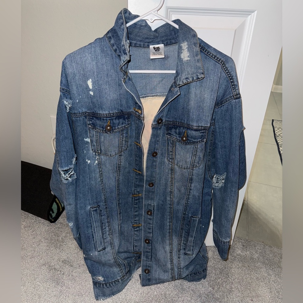 Distressed vintage denim jacket
